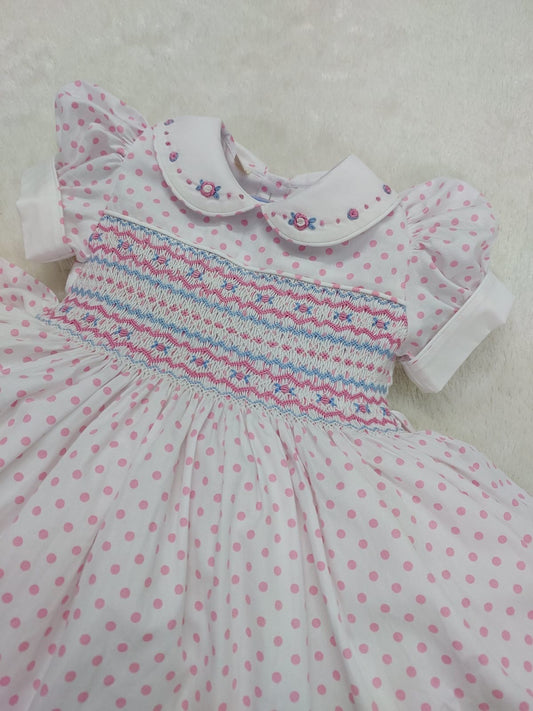 Pink and white polkadot smocked dress
