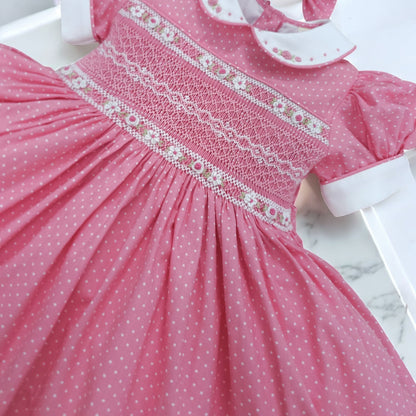Pink polkadot with white smocking and embroidery ( got matching romper available )