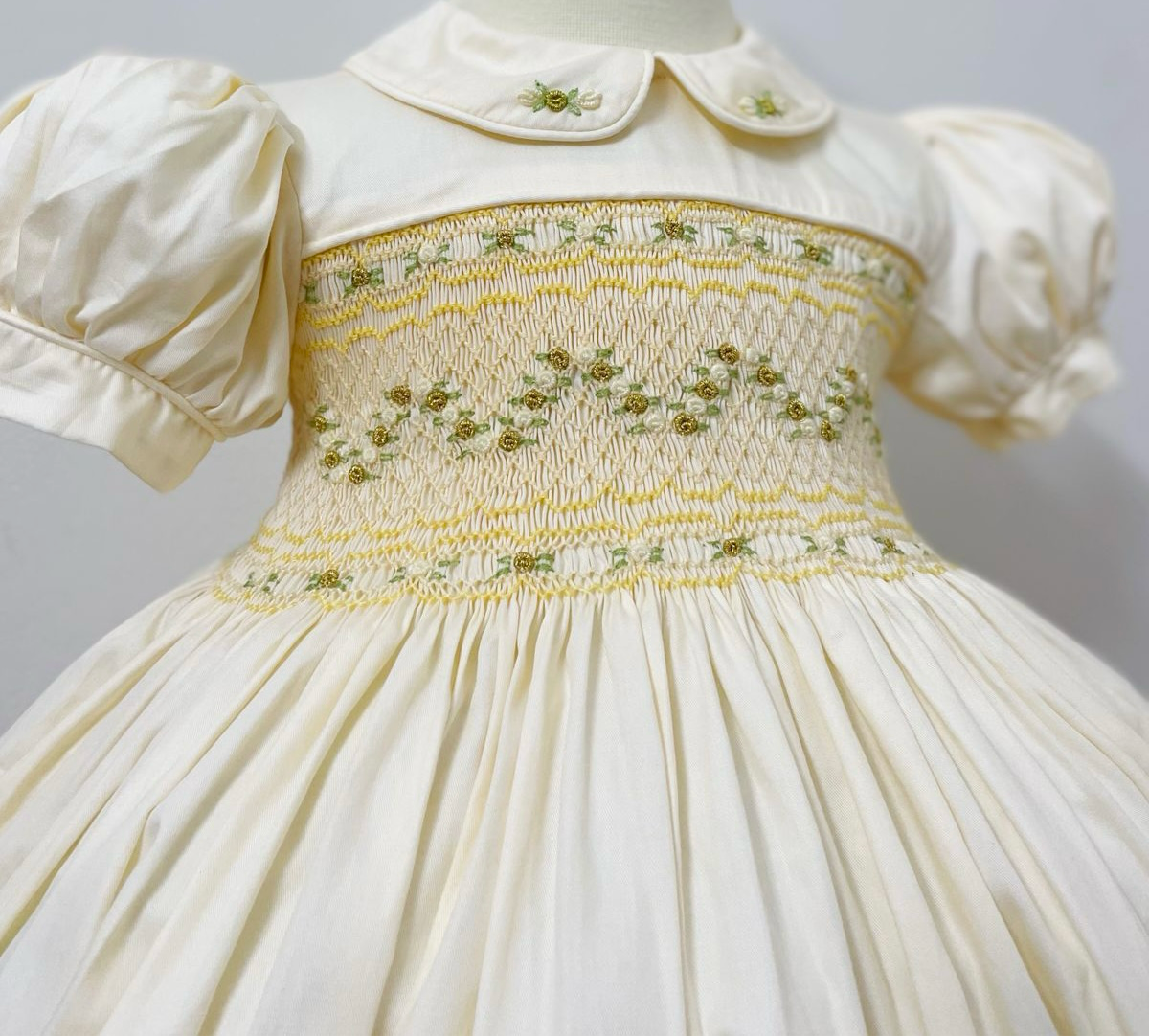 Cream and gold smocked back and front