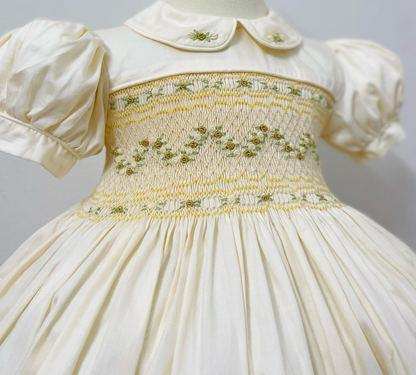 Cream and gold smocked back and front