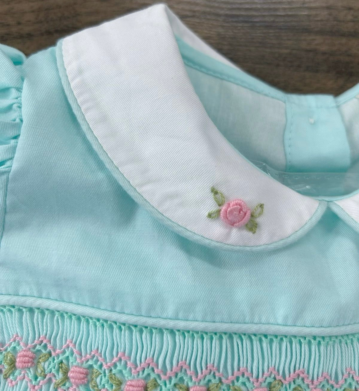 Mint smocked dress with pink embroidery