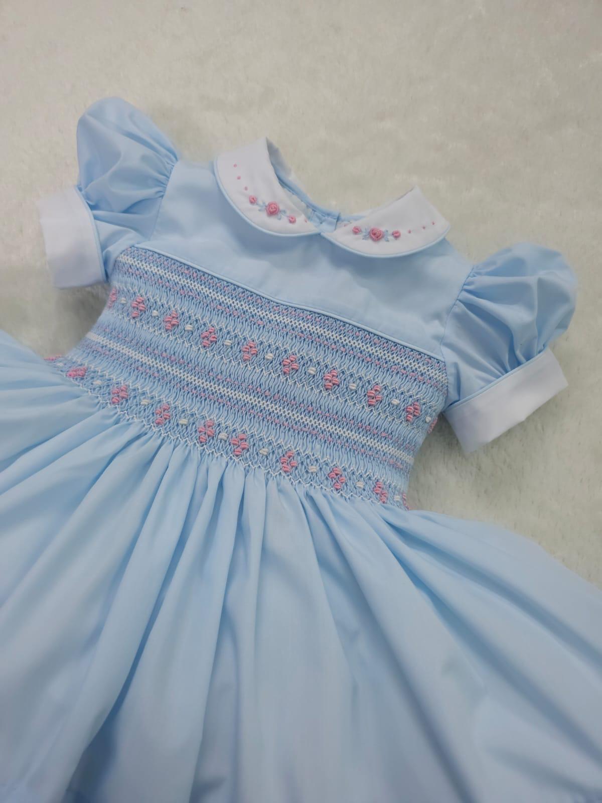 Baby blue smocked back and front
