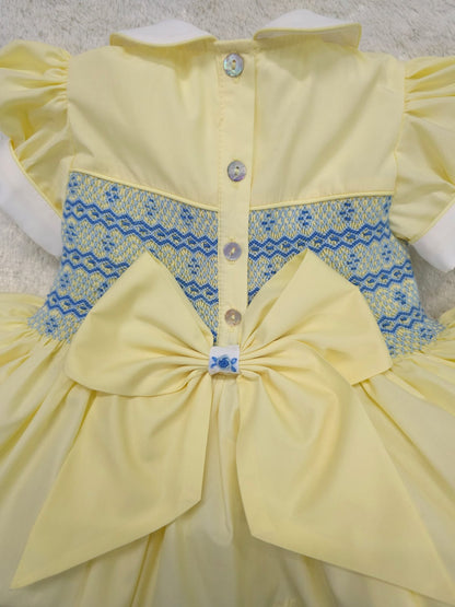 Lemon with blue smocked back and front with fixed bow. ( have matching boys suit available )