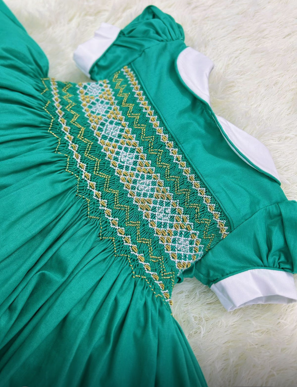 Green with gold smocking ( got matching boys suits ) PRE ORDER HERE IN 2 WEEKS