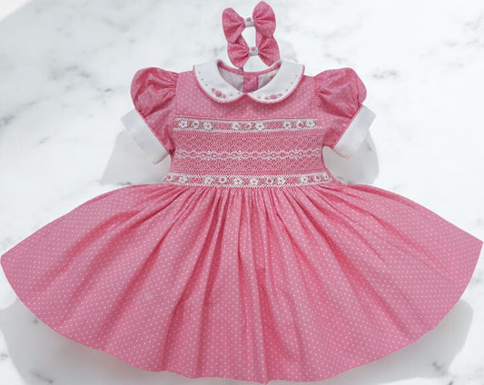 Pink polkadot with white smocking and embroidery ( got matching romper available )