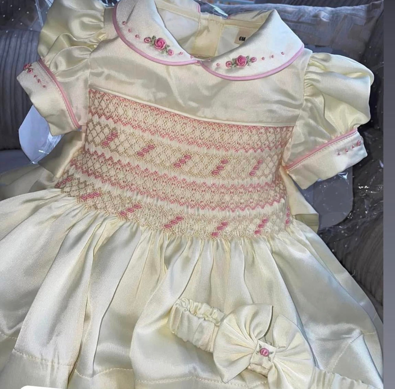 Butter cream and pink smocked dress