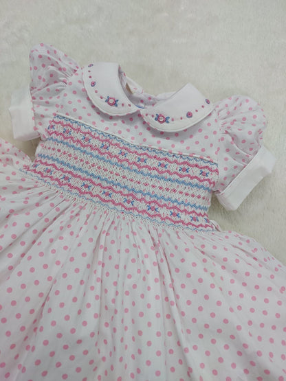 Pink and white polkadot smocked dress