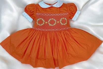 Orange smocked dress