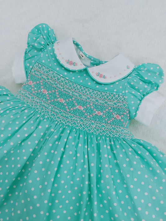 Turquoise polkadot smocked dress