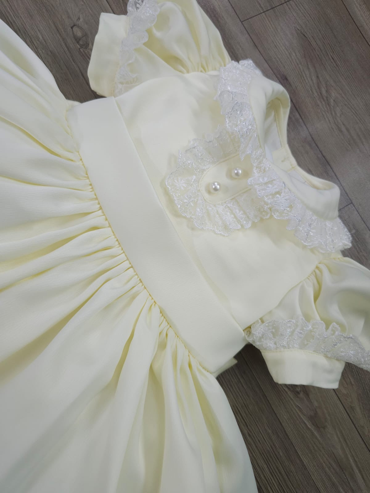 Cream classic dress with lace collar and sleeves and pearl buttons