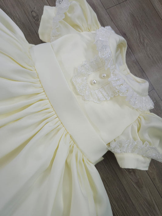 Cream classic dress with lace collar and sleeves and pearl buttons