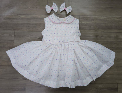 Sleeveless classic Swiss dot dress