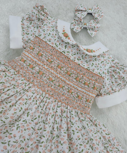 Floral smocked dress with peach embroidered flowers