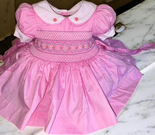 Pink with lilac smocked back and front