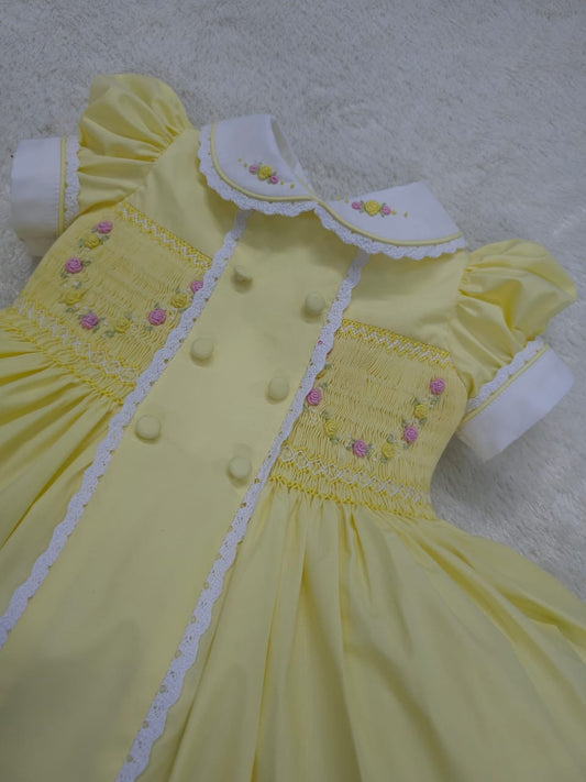 Lemon smocked garland dress with buttons on front