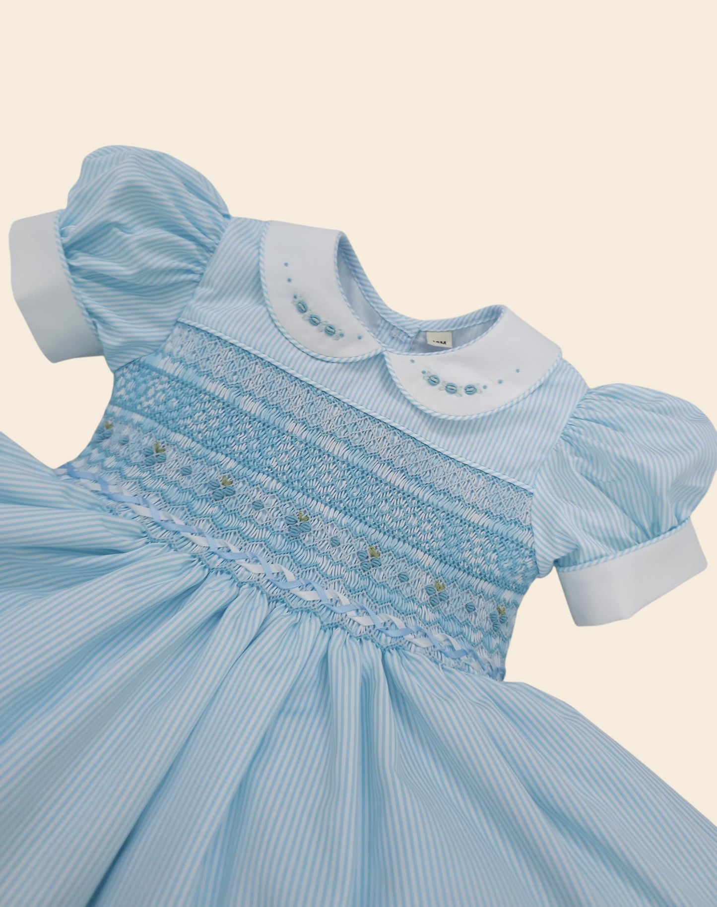 Blue stripe smocked back and front ( got matching boys suit available )