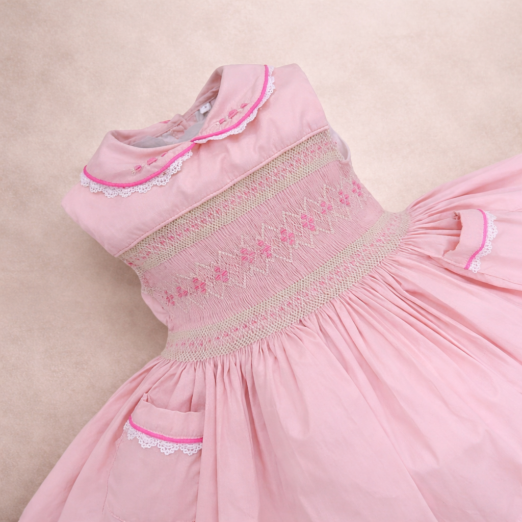 Blush Pink sleeveless smocked dress