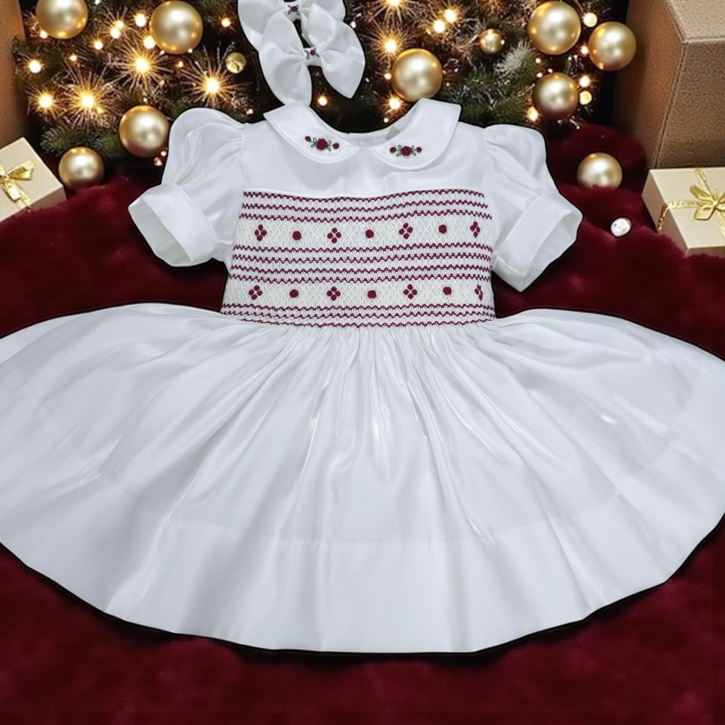White shimmer with burgandy smocking and pearls