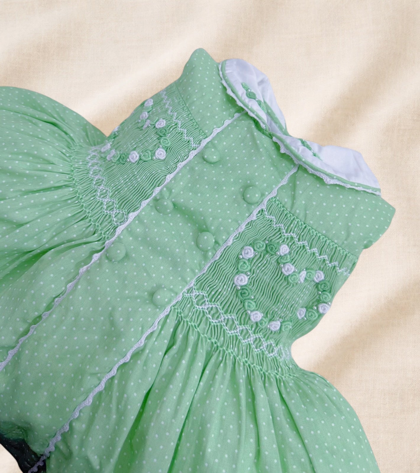 Green polkadot sleeveless smocked dress ( have matching boys suit available)