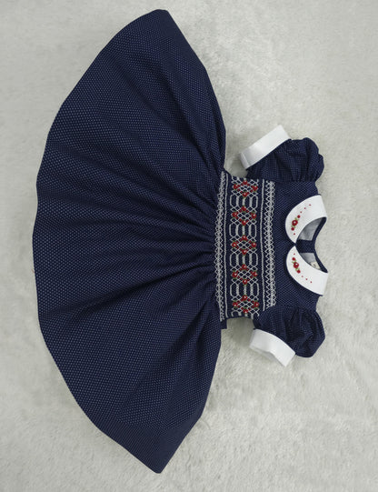 Navy polkadot with red and white smocking ( got matching boys suit available and matching girls romper  )