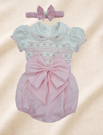 Baby pink hand smocked girls romper