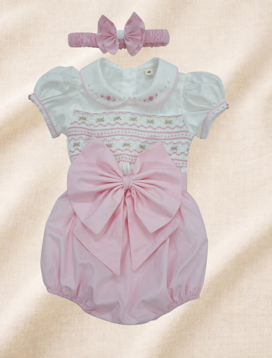 Baby pink hand smocked girls romper