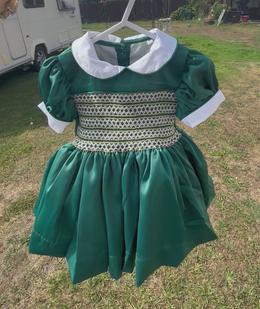 Emerald green satin with gold smocking